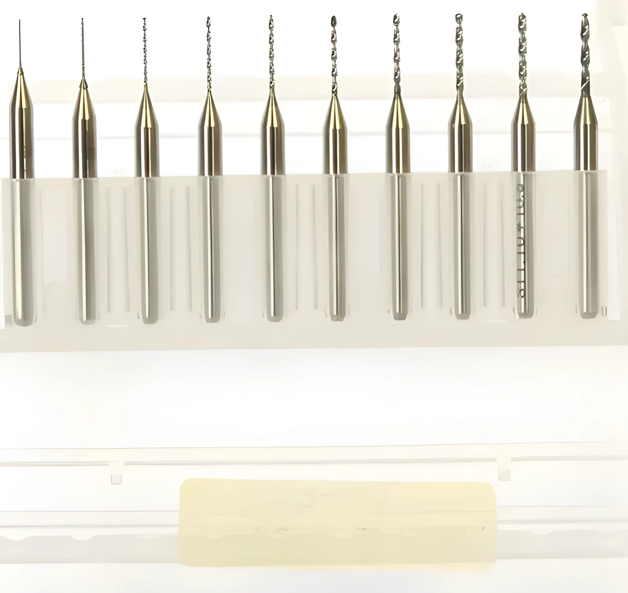 Close-up of imported tungsten carbide micro engraving bits for industrial electronics and precision machining.