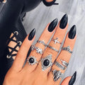 Vintage knuckle rings set with gold, silver, black and turquoise elephant, lotus, moon and flower designs
