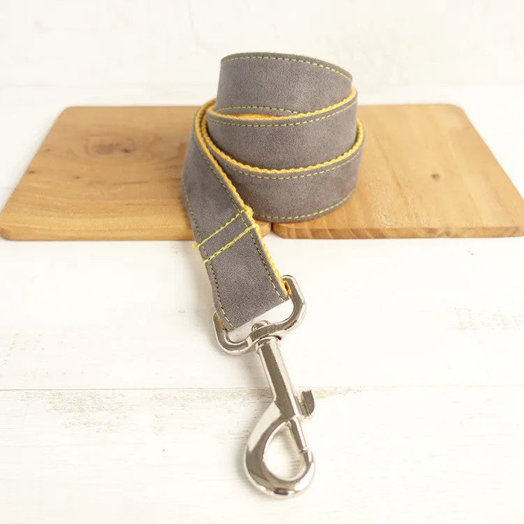 Grey and yellow polyester dog leash on plain background, available in multiple sizes from XS to XL