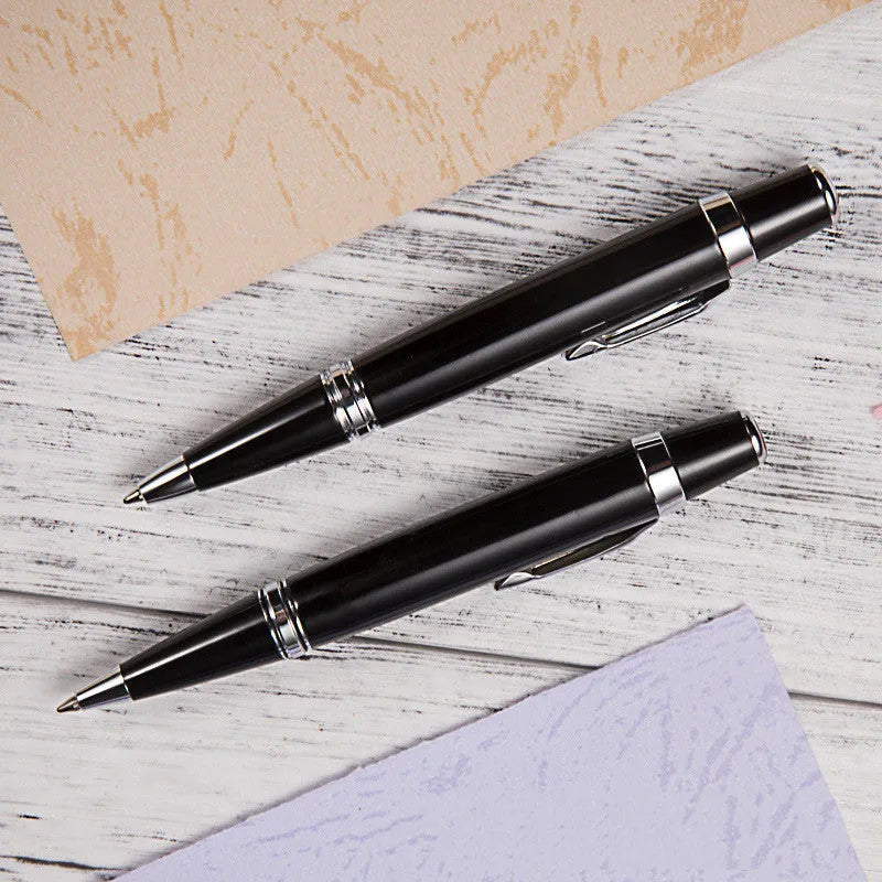 Short black metal ballpoint pen with rotating mechanism showing 112mm length and 12.5mm diameter