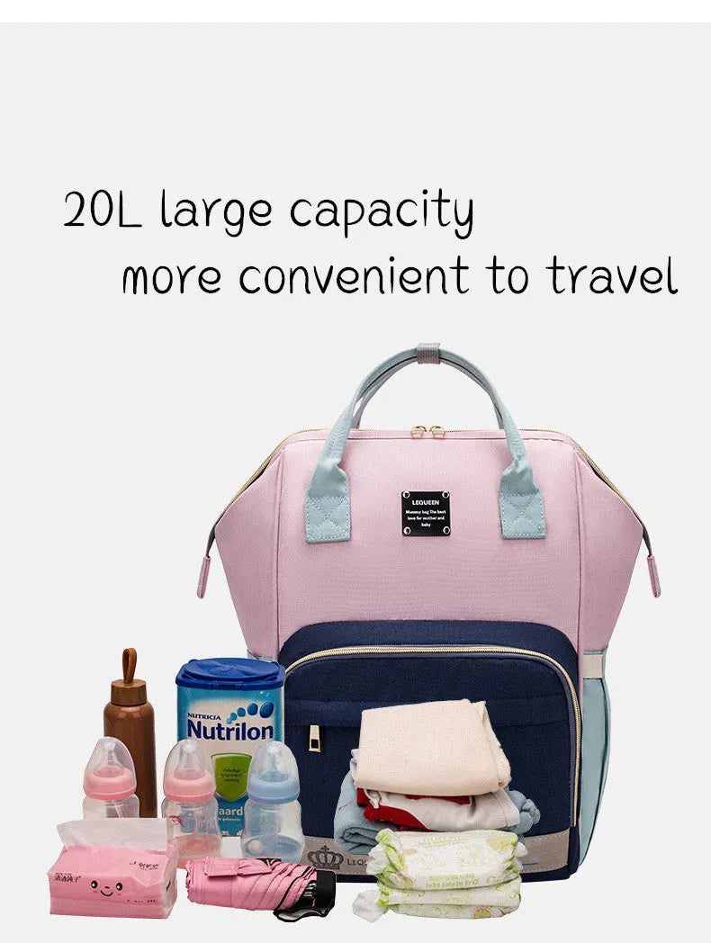 Mummy maternity bag backpack in solid colour with zipper closure and nylon finish