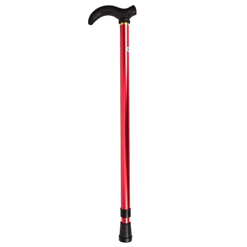 Telescopic aluminium walking stick with rubber tip on outdoor trail, six-grade adjustment knob visible on shaft
