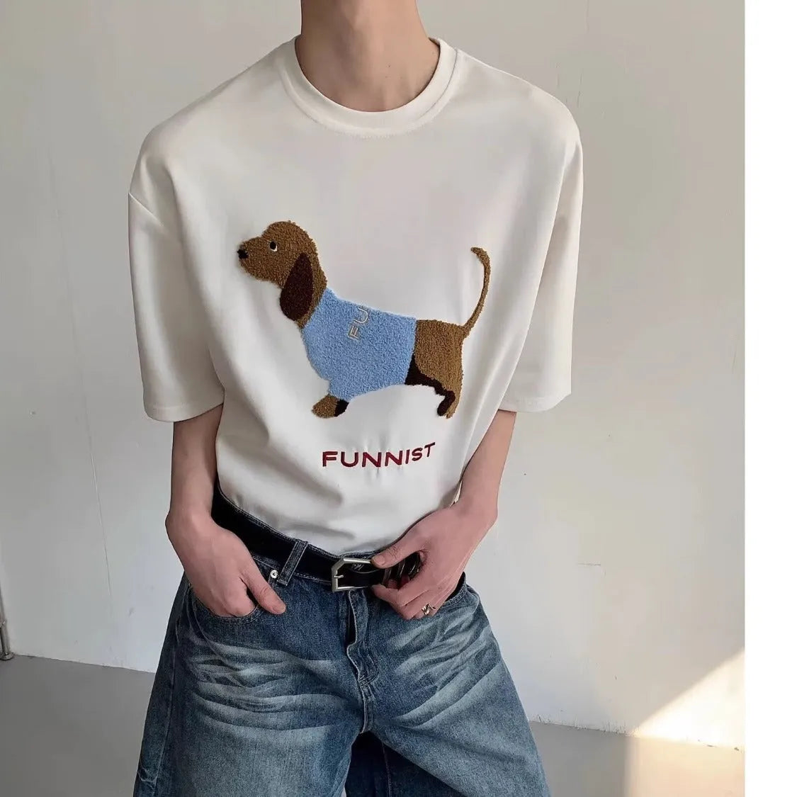 Men's grey cotton T-shirt with an embroidered brown sausage dog design on the front.