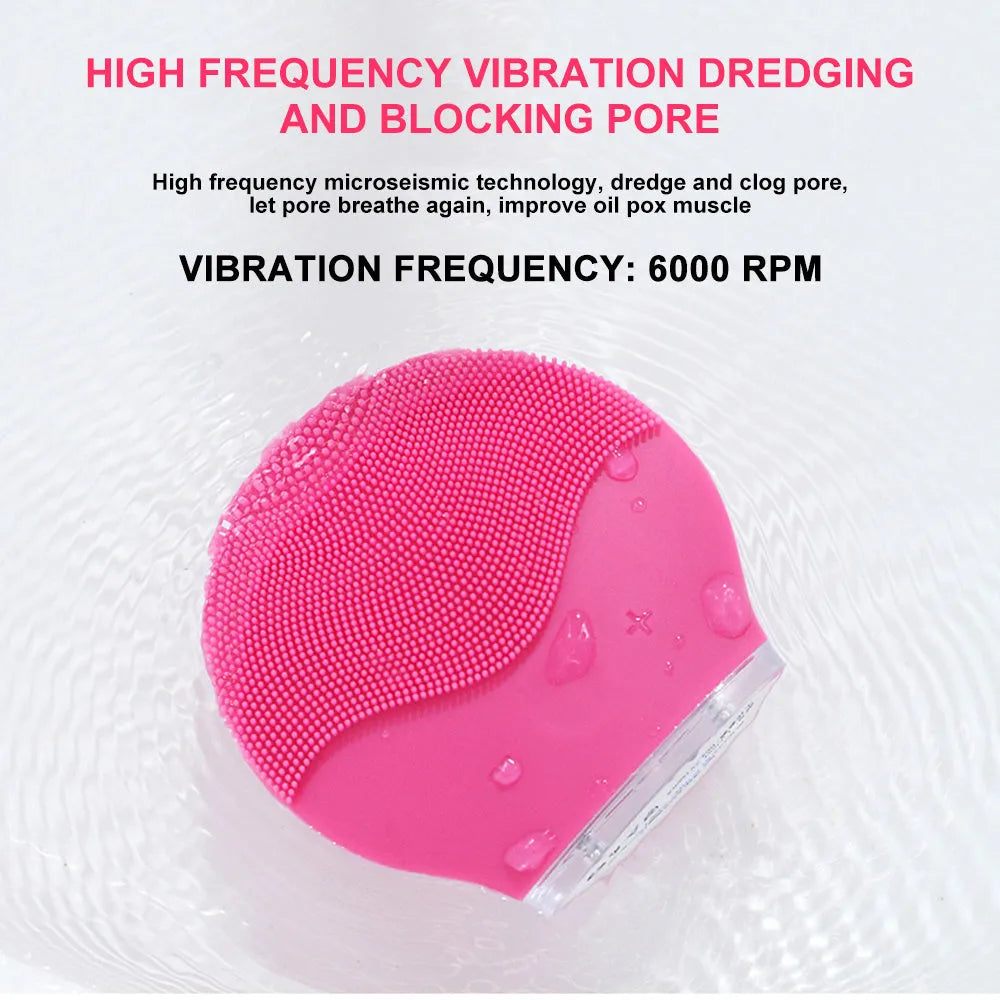 Electric waterproof silicone cleansing instrument mini facial brush in pink with USB cable