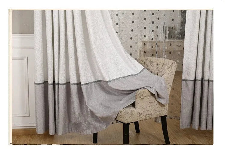 Blackout curtain panel showing light-blocking fabric, available in multiple widths with hook or rings for hanging.