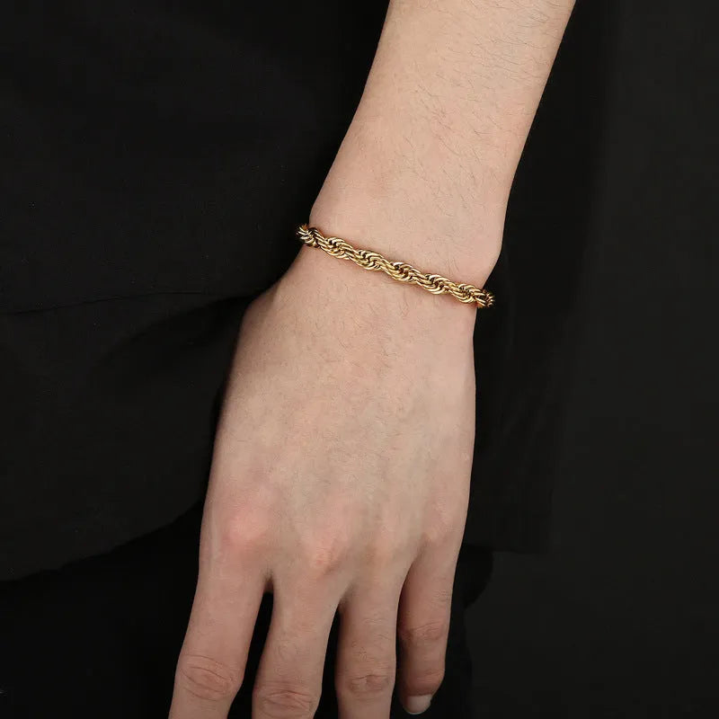 Double colour twist chain bracelet in titanium steel with electroplated finish, available in black, gold, silver