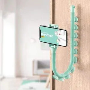 Flexible rubber phone holder with suction cup wrapped around bicycle handlebar