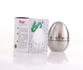 Stainless steel egg-shaped mechanical kitchen timer on countertop