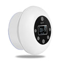 White waterproof Bluetooth speaker for bathroom with 12-hour battery and compact design
