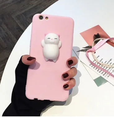 Soft silicone TPU iPhone case with a 3D cartoon cat design, shown in pink.