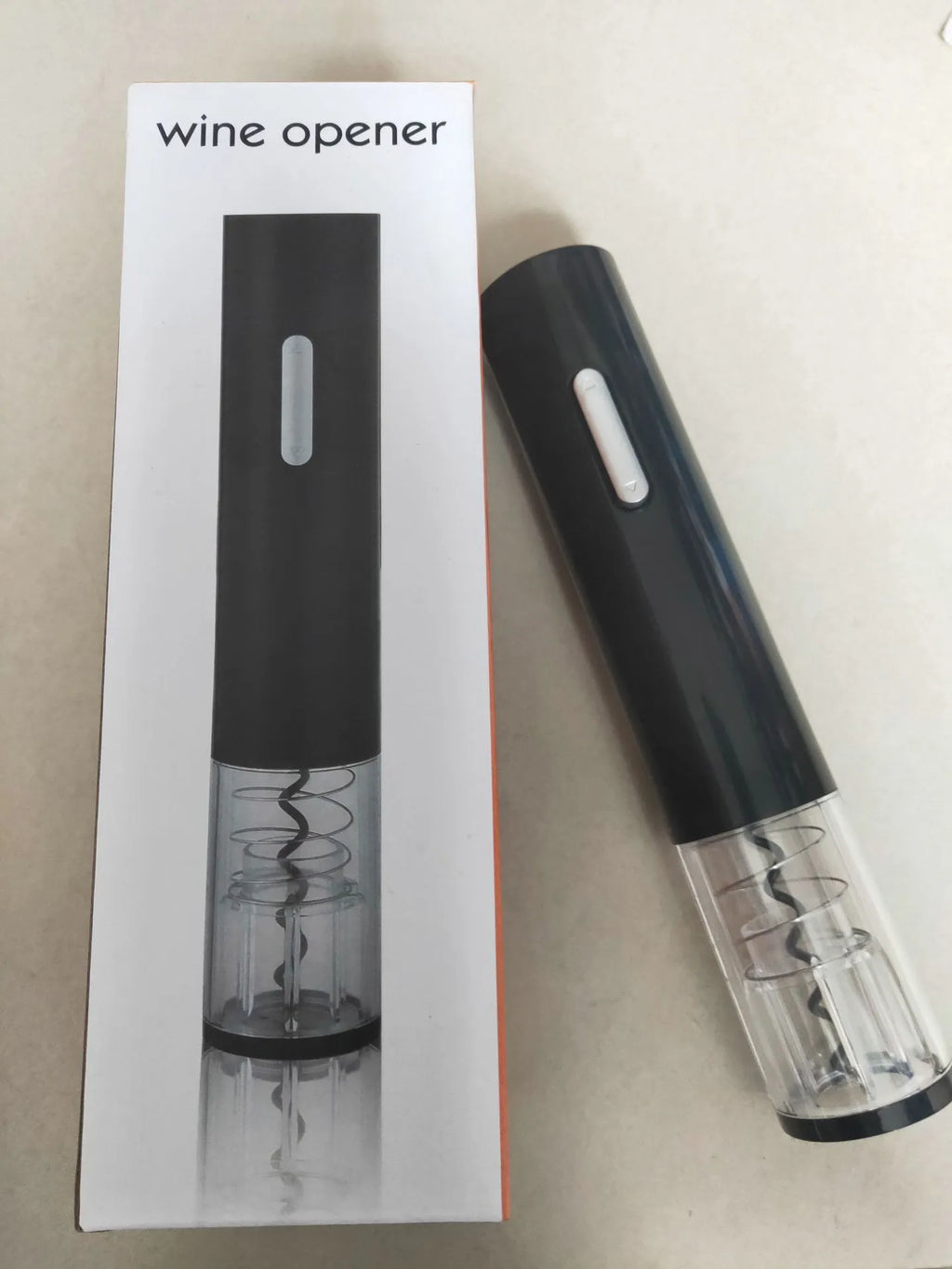 Electric wine bottle opener with automatic corkscrew and foil cutter in black, red or white colours