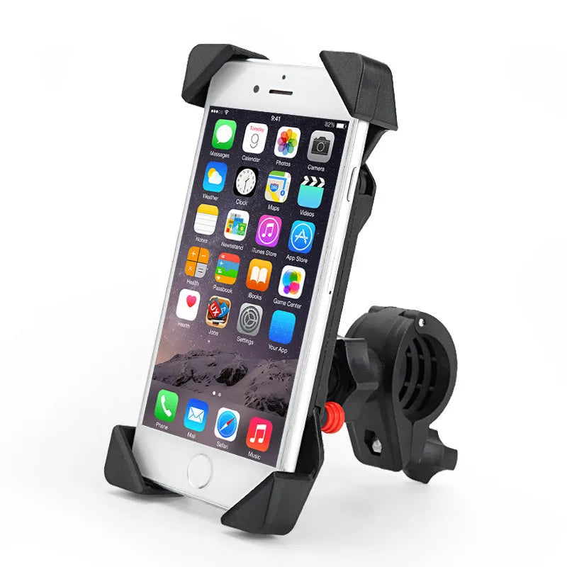 Black ABS motorcycle phone holder with USB port mounted on a handlebar, showing phone clamp and charging cable.
