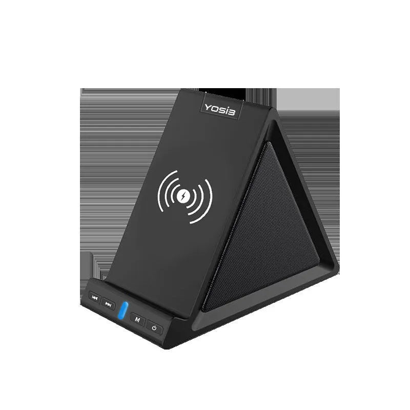 Black multifunctional Bluetooth speaker with integrated phone stand and wireless charging pad, showing size relative to a mobile phone.