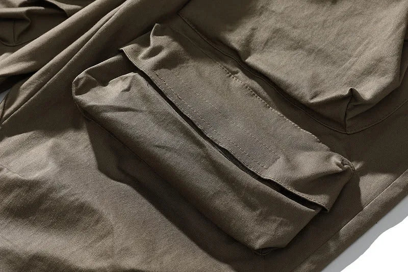 Men's cargo trousers in khaki or black, straight leg, mid-waist, drawstring ankle, cotton blend.