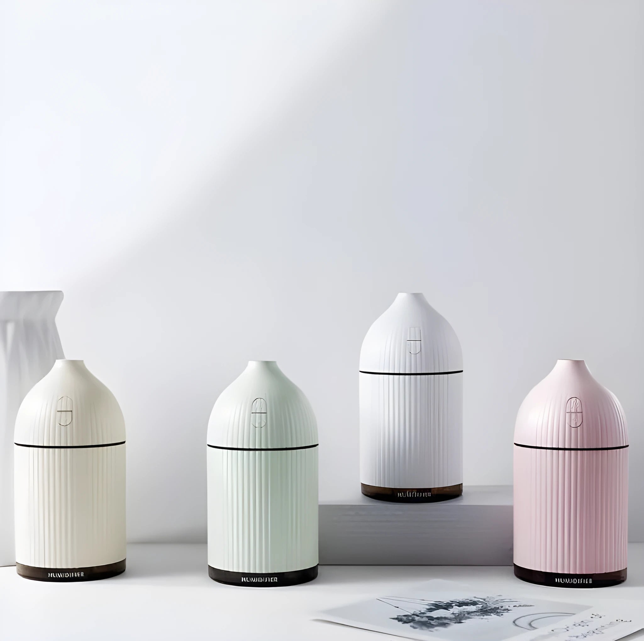 White 300ml USB ultrasonic aromatherapy diffuser with LED light measuring 80x80x155mm