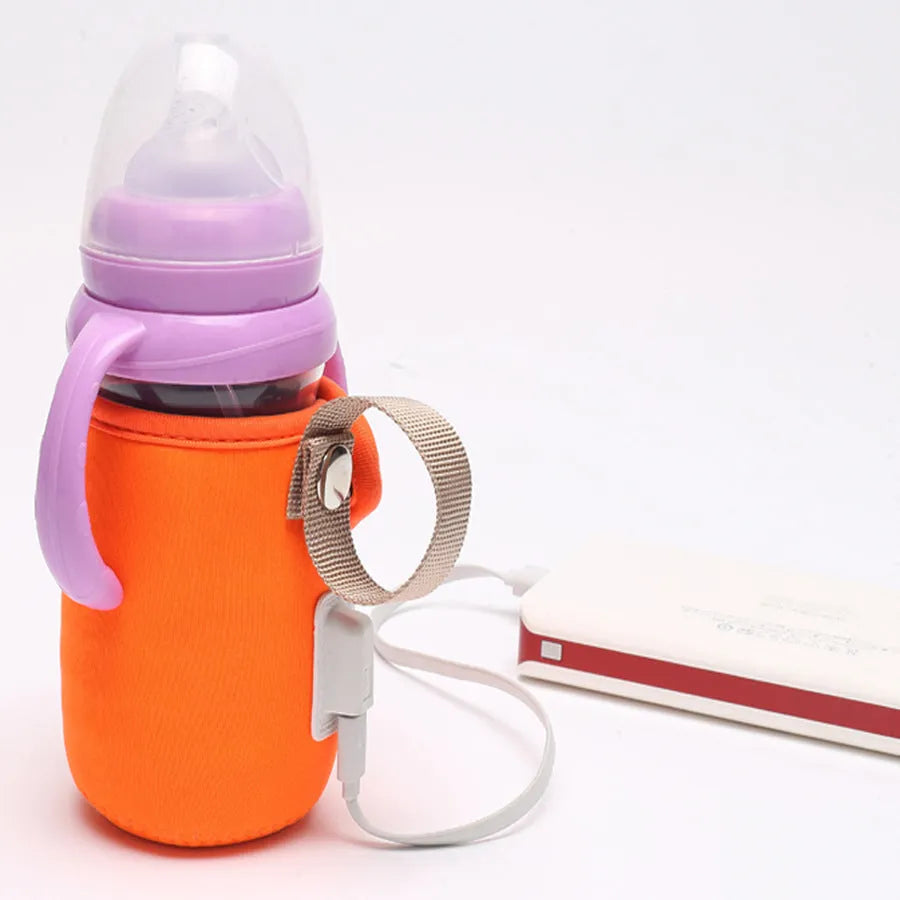 Long orange cotton USB baby bottle warmer wrapped around a milk bottle.