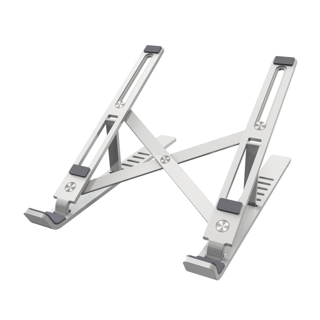 Silver aluminum folding laptop stand shown at an angle on a desk
