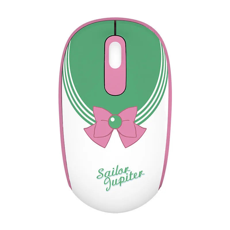 Pink Sailor Moon wireless mouse with USB receiver on a desk.