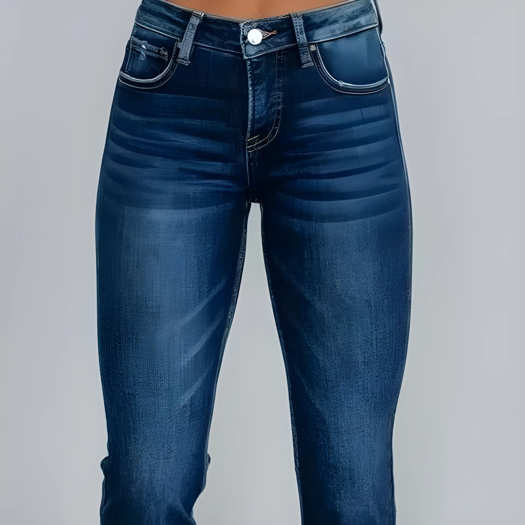 Women's solid colour denim jeans in dark blue showing hand-worn texture and casual fit.