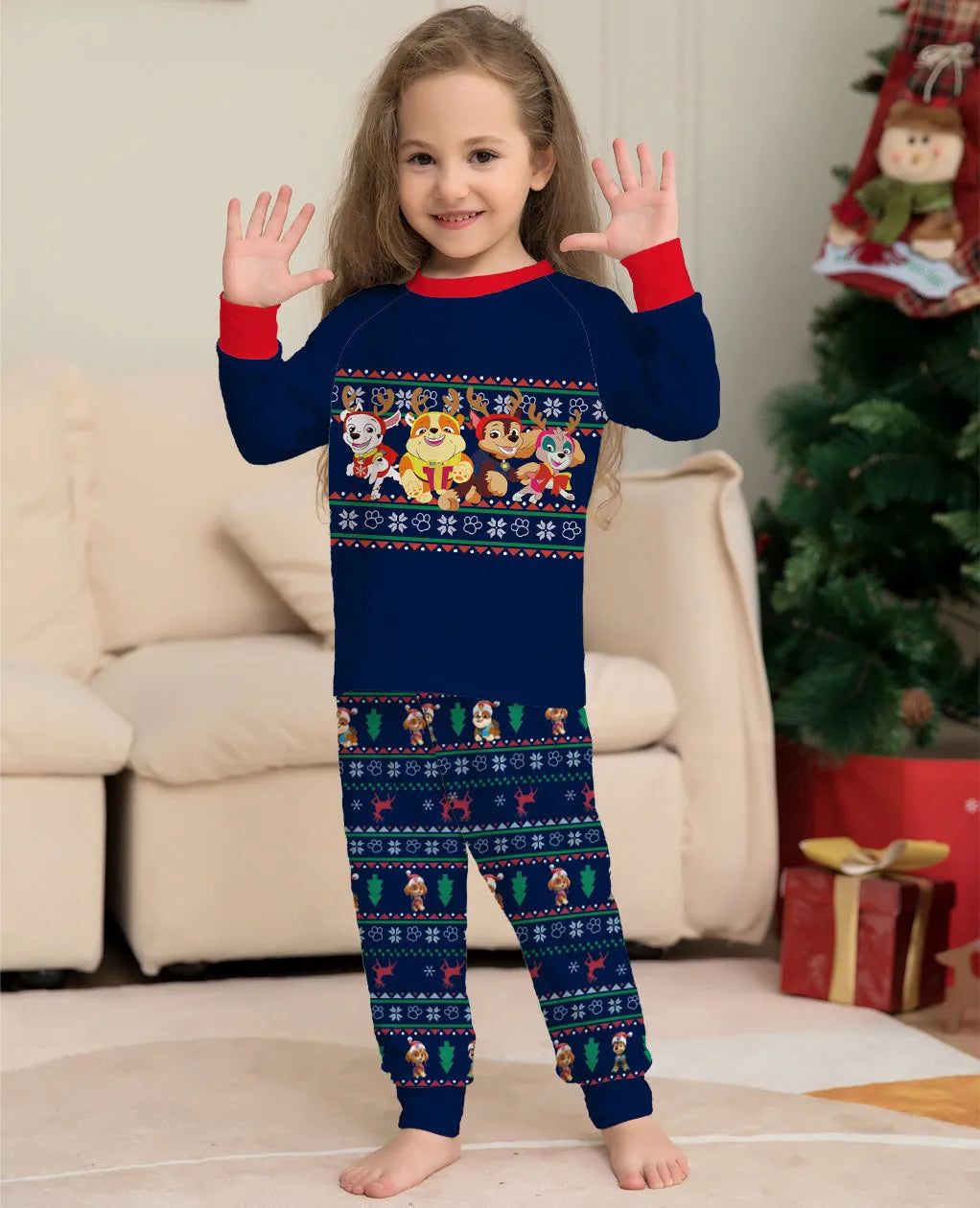 Red plaid family pyjamas set with cartoon deer print for adults, children, baby, and dog.