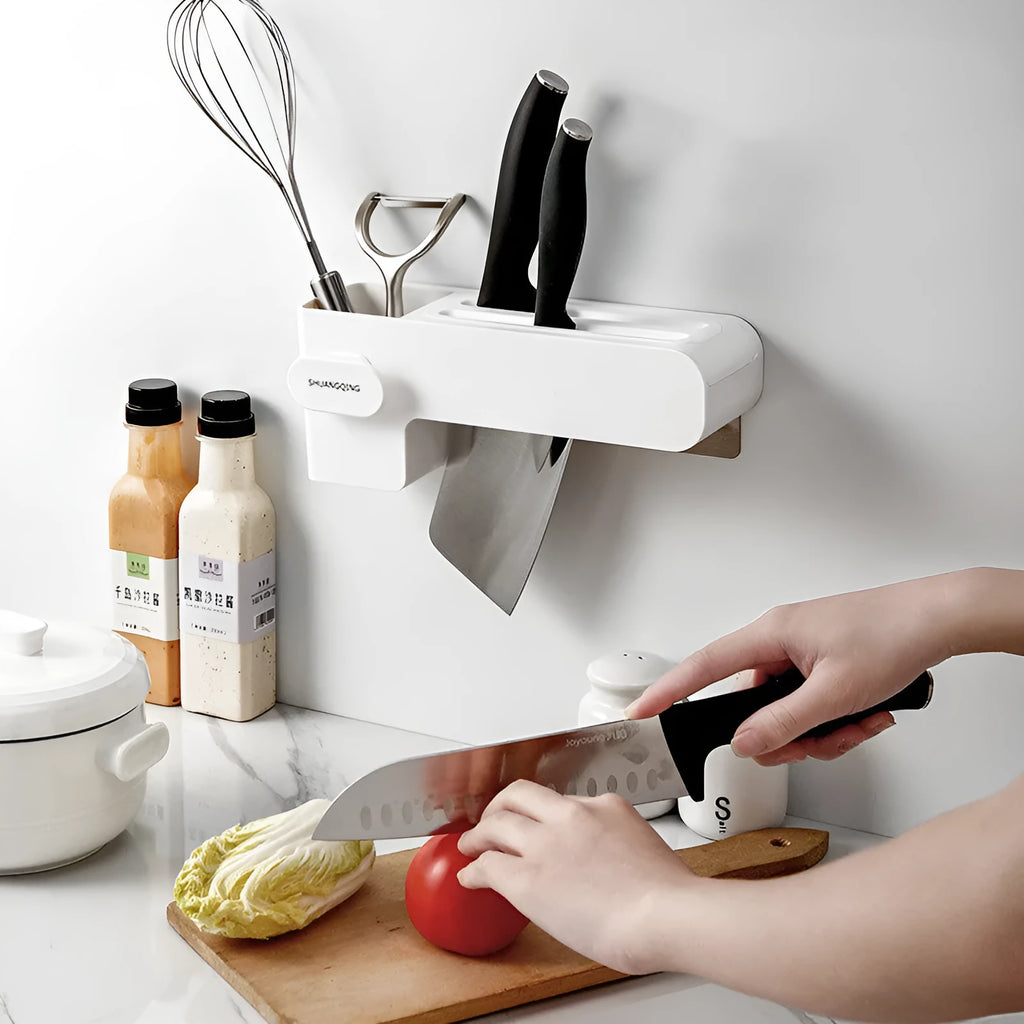 White plastic kitchen knife rack with modern simple design placed on countertop