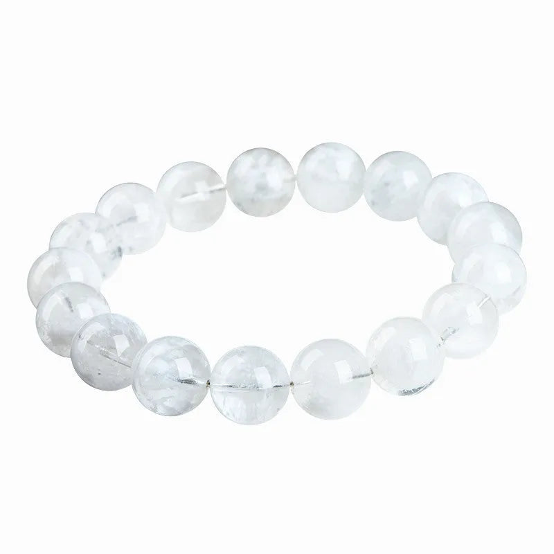 Original design women's crystal bracelet with natural blizzard snowflake round beads on a wrist.