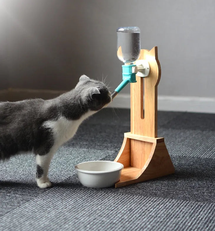 Cat drinking water dispenser with bamboo wood holder and 300ml water container in grey, green, and pink