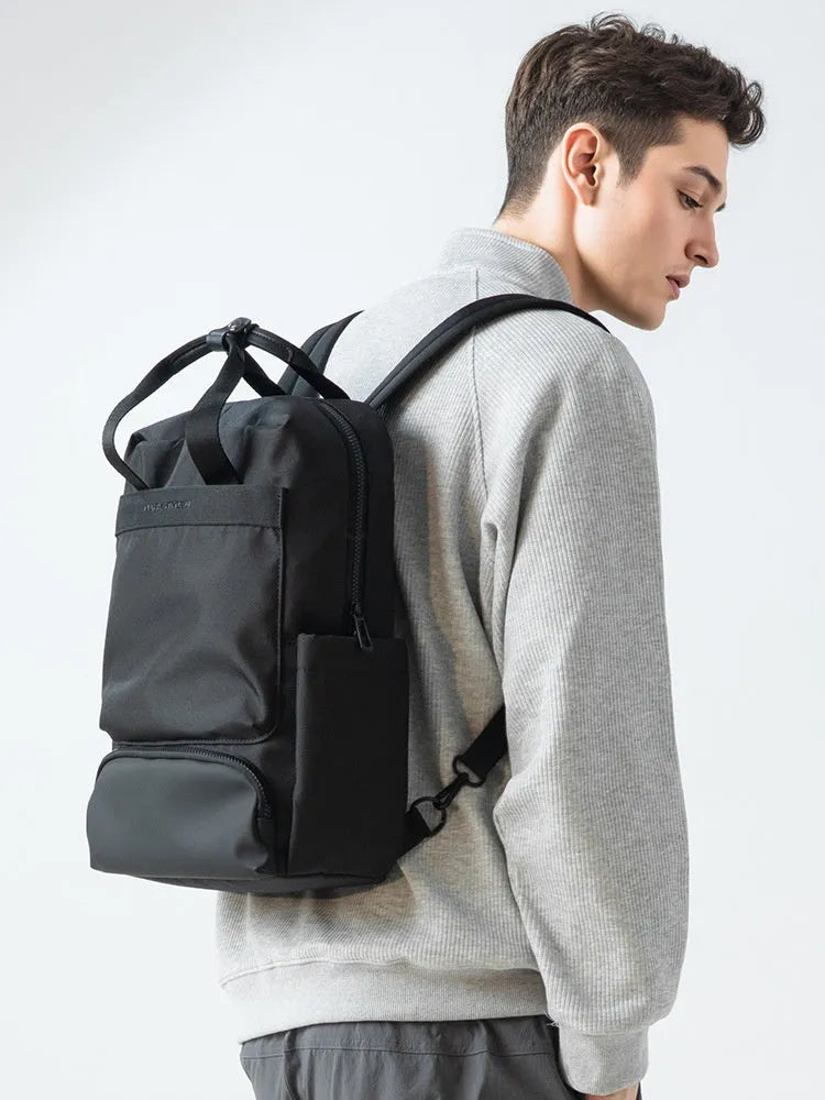 Black Oxford cloth computer backpack with a 20-35 litre capacity.