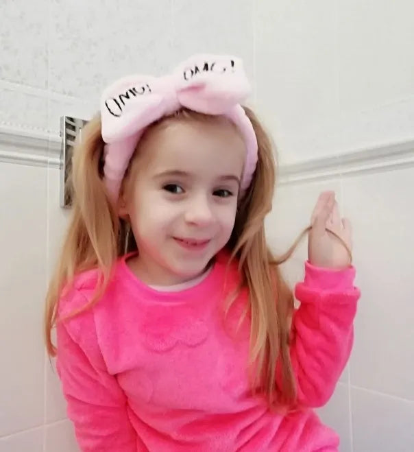 Coral velvet butterfly end hair band in pink with letter text styling
