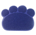 Claw-shaped rectangular PVC cat litter mat in dark blue, 30x40cm, placed in front of a litter tray
