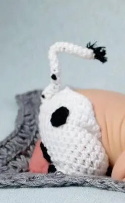 White hand-knitted baby cow suit set with hat and pants made from wool cotton blend