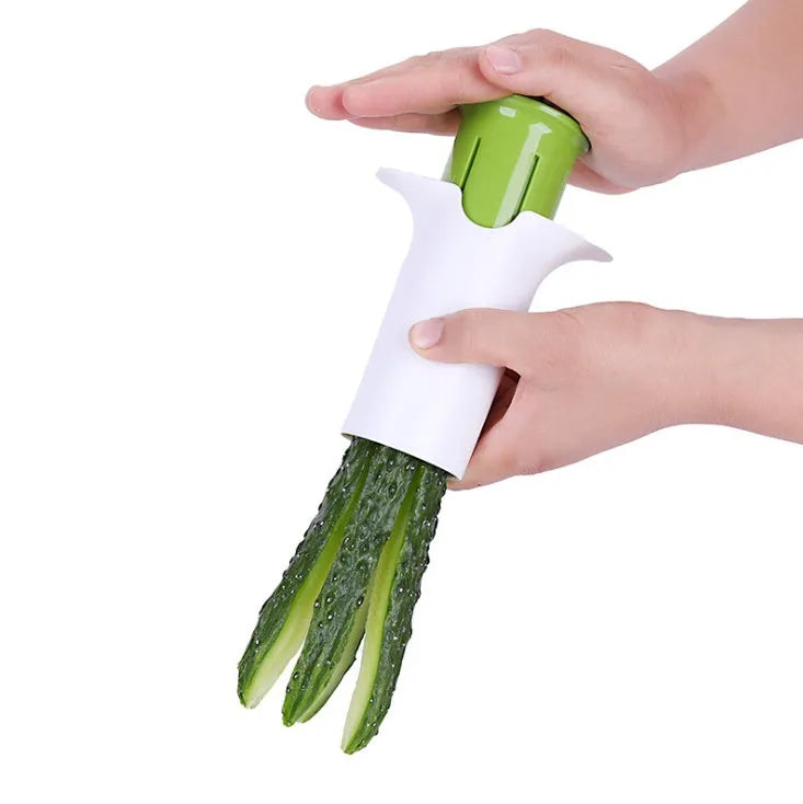 White plastic vegetable and fruit cutter with six stainless steel blades inside