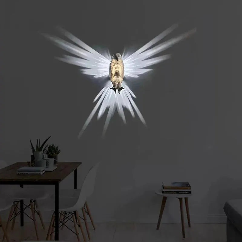 3D print resin wall lamp shaped like an owl projecting light and shadow onto a wall