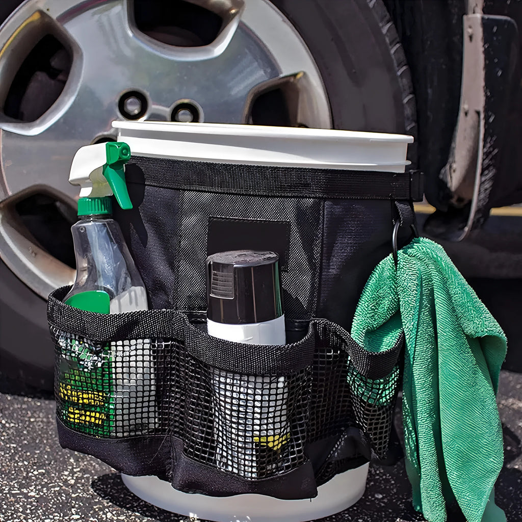 Black cylindrical polyester storage bag hanging on a 5 gallon bucket.