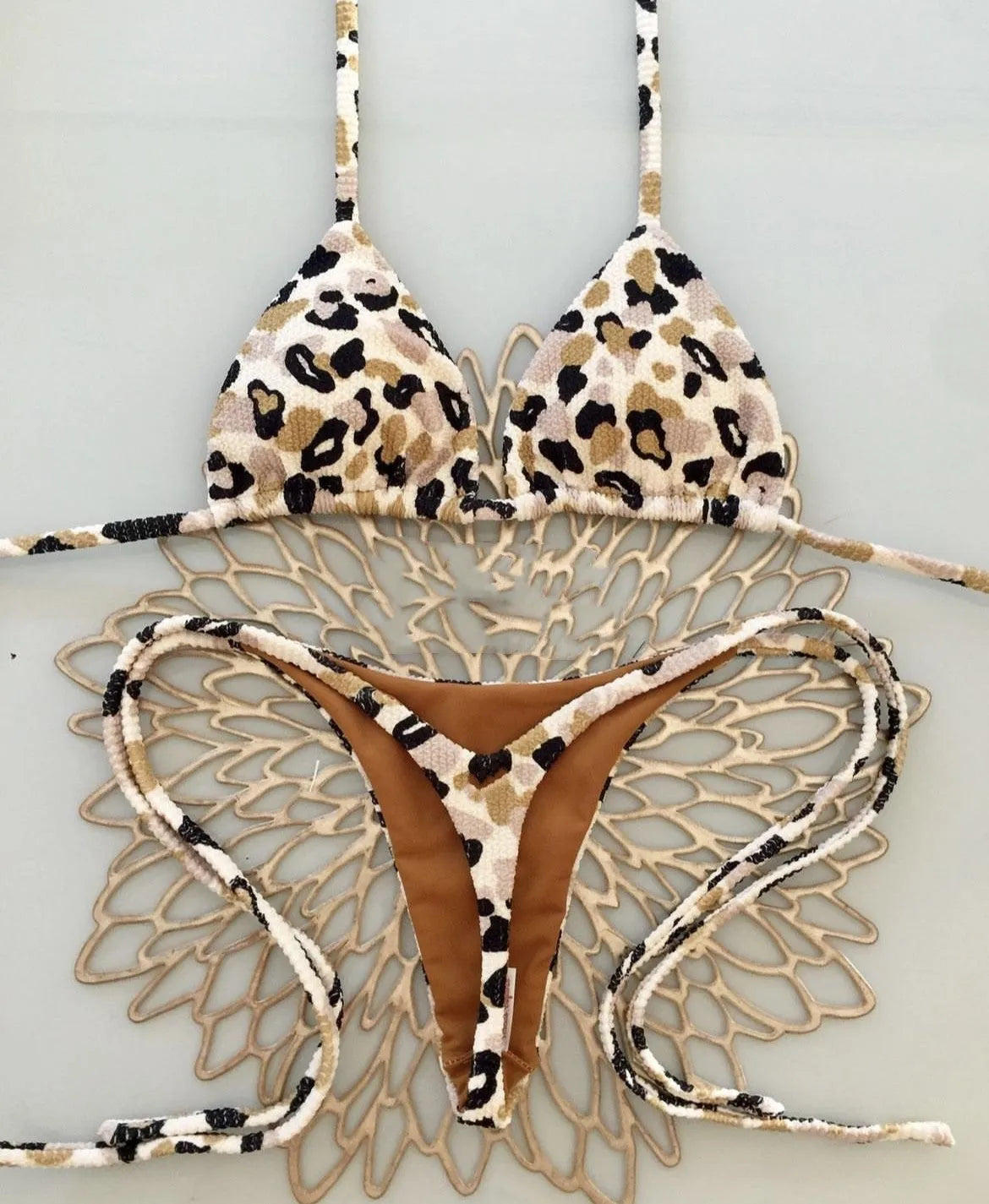 Women's printed nylon bikini swimsuit with cotton-lined briefs in three colour options