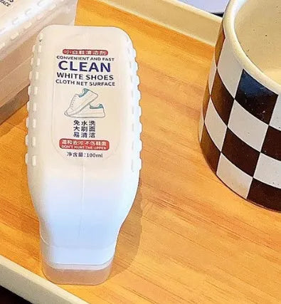 White shoes dry cleaning agent with brush head and detergent bottle for leather shoe scrubbing