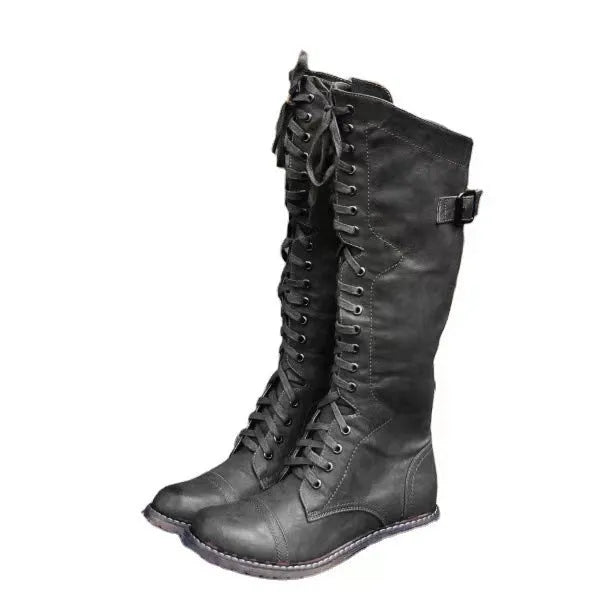 Women's black chunky heel ankle boots made of artificial PU leather with a round toe.