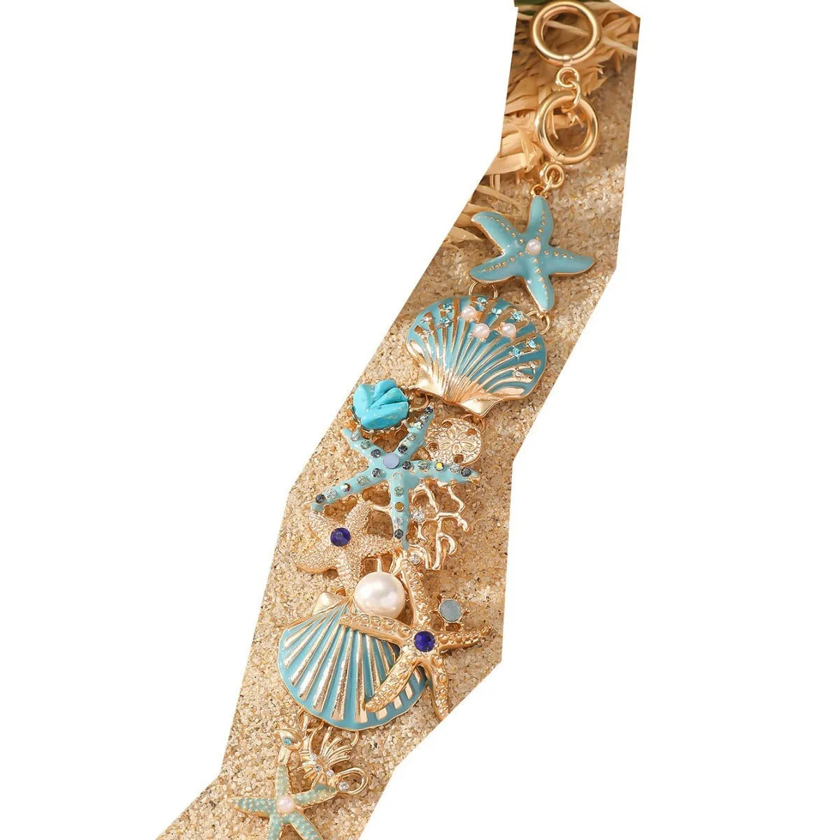Women's alloy nautical bracelet with boat anchor and starfish charms in coral blue, red, or turquoise.