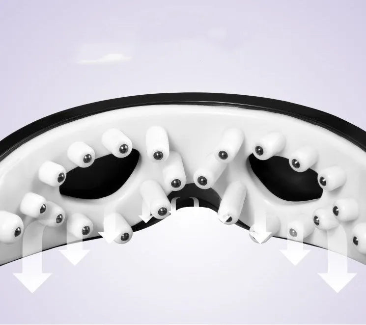 Eye massager with adjustable headband, silicone contacts, and 9 vibration modes in black and white colour