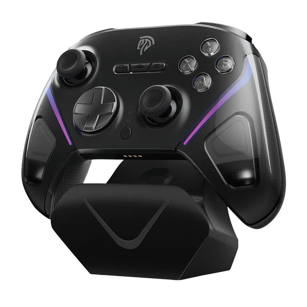 Smart Startstop Rocker game controller on its charging base, shown in Black, Green, and Purple colour options.