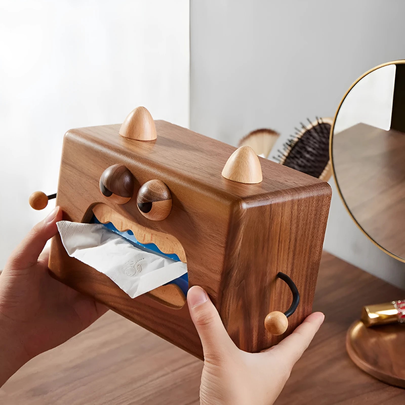 Wooden cartoon Little Monster tissue box in walnut beech finish, 190mm long by 104mm wide by 125mm tall