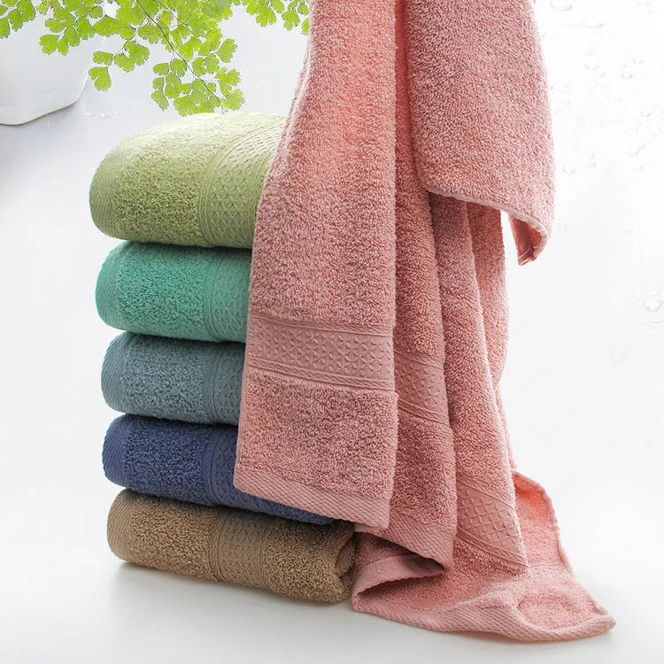 Thickened cotton blend bath and beach towel shown in one of its available colours like apple green or dark blue