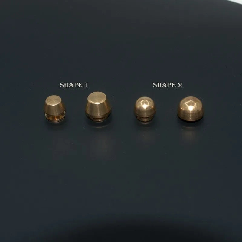 Brass decorative buckle showing round and bucket foot nail styles in 10x6mm and 12x7mm sizes