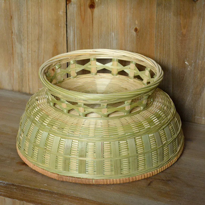 Handmade woven bamboo storage basket showing traditional craftsmanship and three size variations