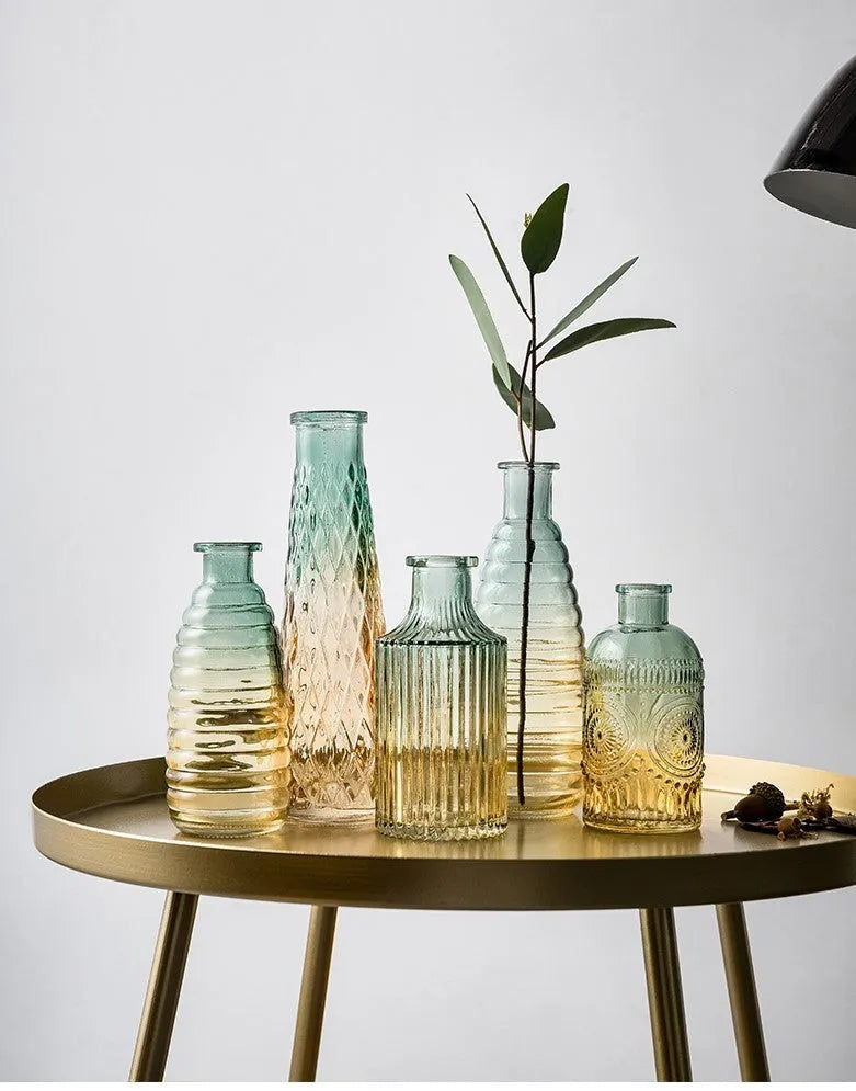 Set of five clear glass vases with colourful electroplated finish and thicker stable bottoms in various sizes