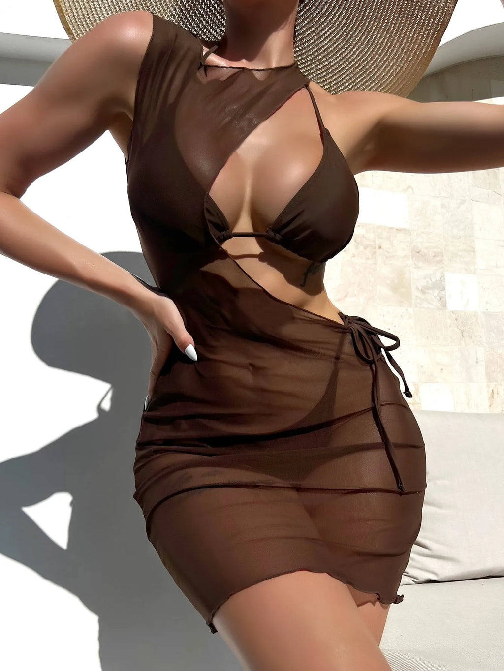 Women's brown three-piece swimsuit set with bra, shorts, and blouse made from nylon