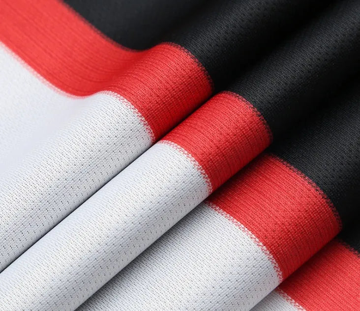 Men's football uniform in black and white cotton blend, one size front view