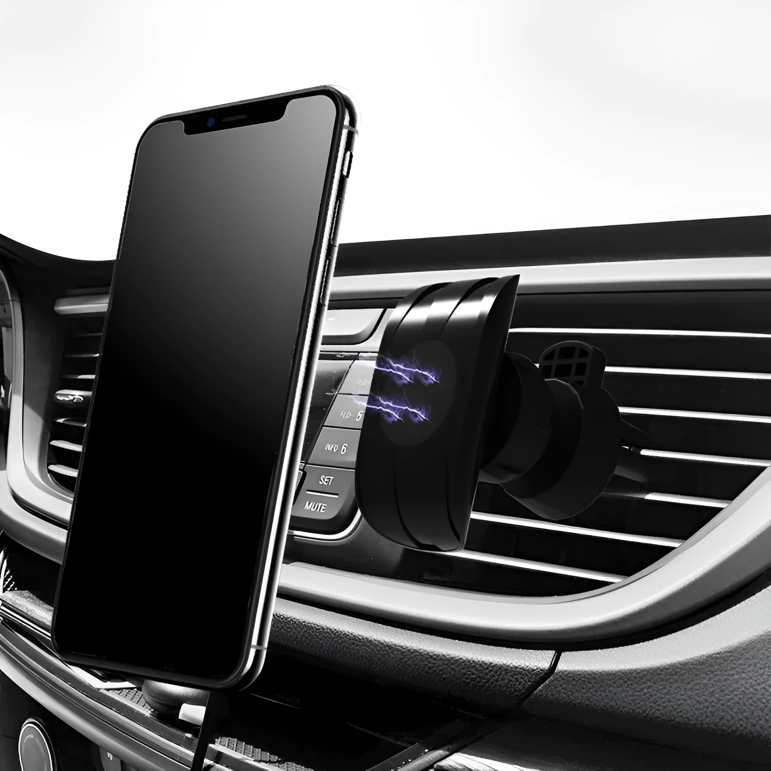 Matte black car phone holder clipped onto a car air vent, holding a smartphone.