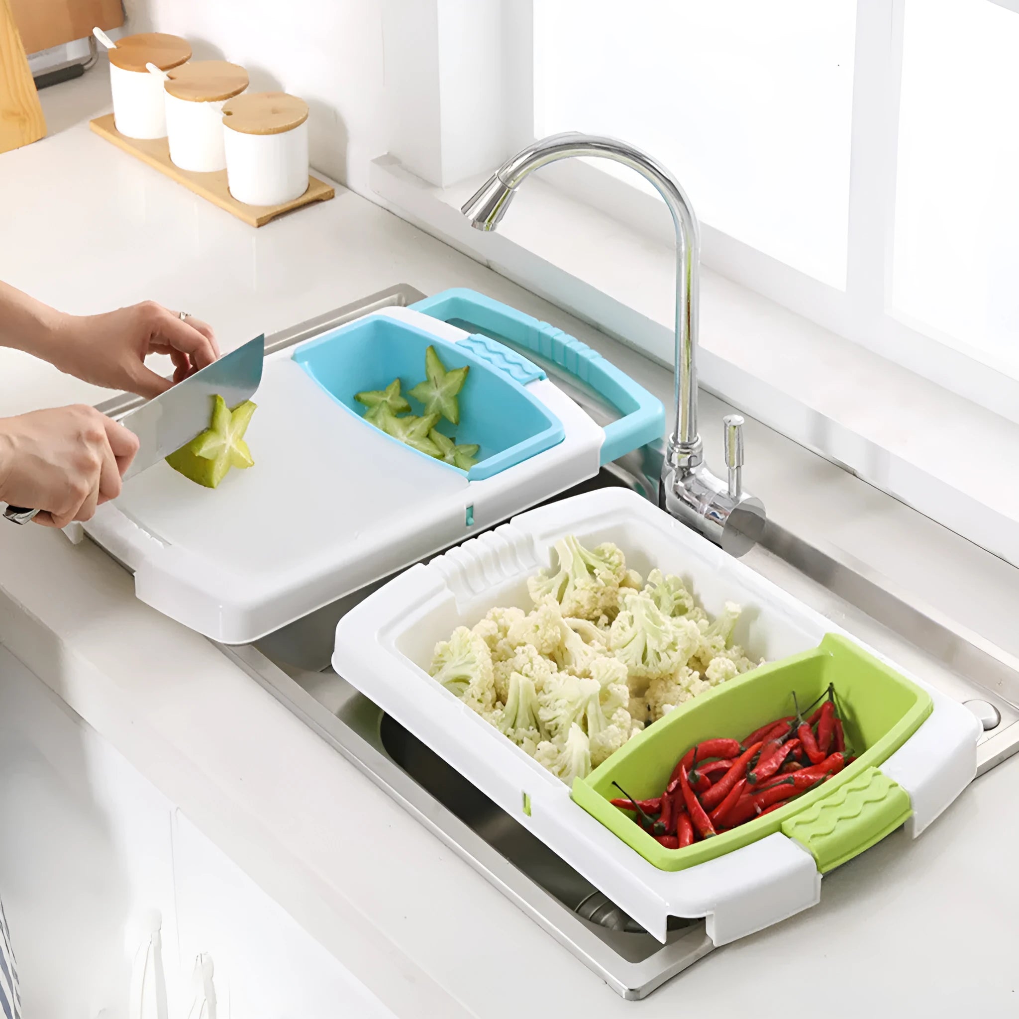 Green multi-function cutting board with drain holes mounted on a kitchen sink edge