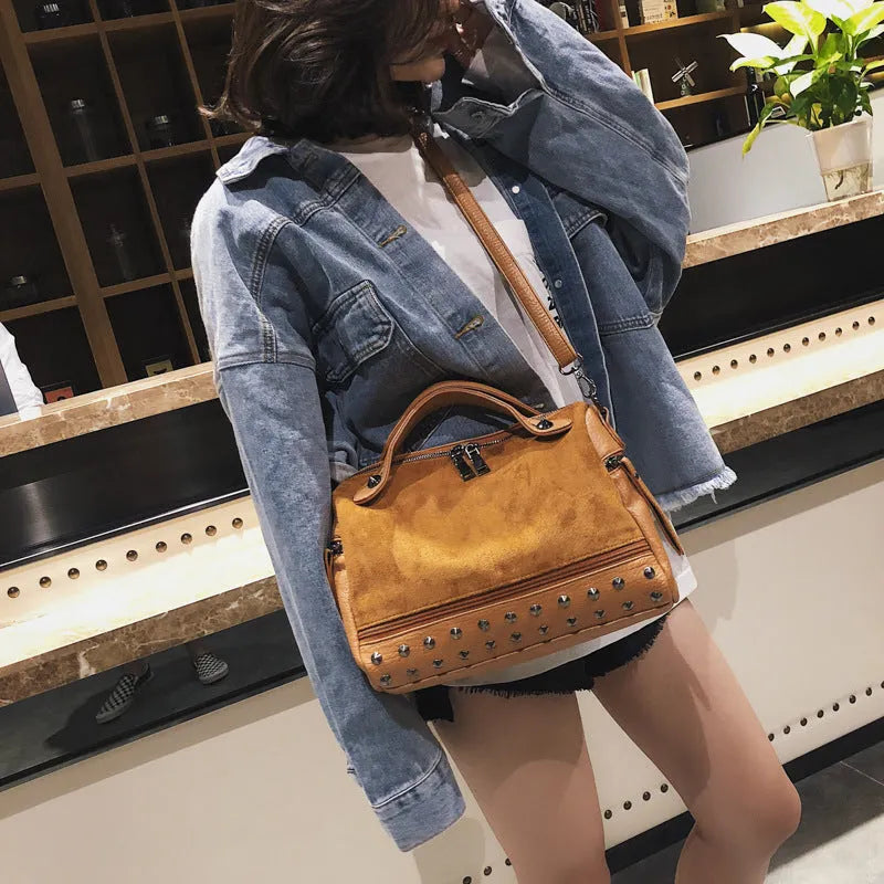 Soft grey PU leather large tote bag for women shown with zip open.